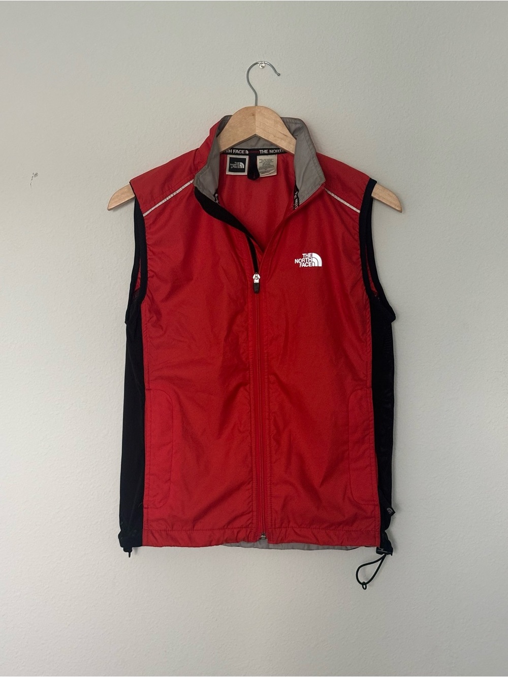 The North Face Red and Black Wonen’s Wind Vest